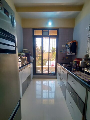 Kitchen in 2 BHK Apartment at Pragati Skyline, Dombivli West – for Sale