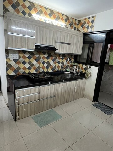 Kitchen in 2 BHK Apartment at Sargam CHS Nanded, Sinhagad Road – for Rent