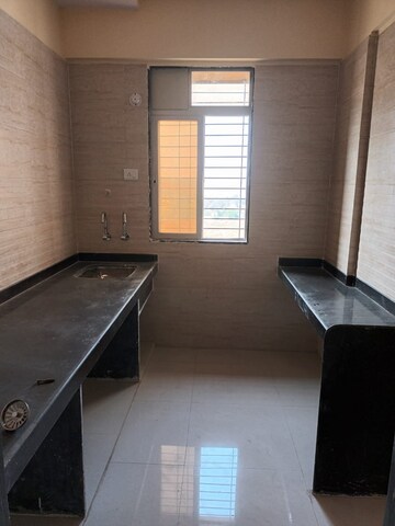 Kitchen in 1 BHK Apartment at Patel Prayosha Pramukh Sadan, Ambernath West – for Sale