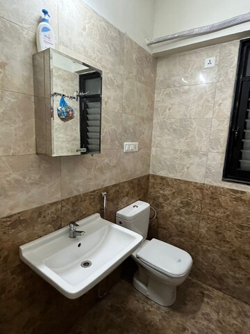 Bathroom in 2 BHK Apartment at Sarang Nanded City, Sinhagad – for Rent