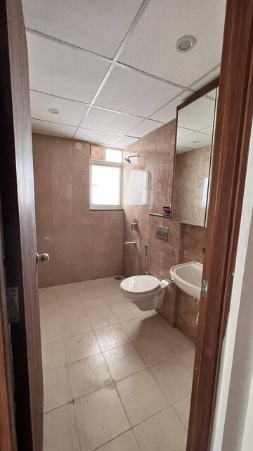 Bathroom in 3 BHK Apartment at Shapoorji Pallonji Joyville Phase 3, Sector 102 – for Rent