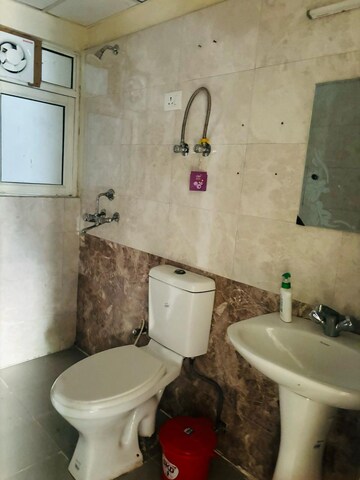 Bathroom in 3.5 BHK Apartment at Aims Golf City, Sector 75 – for Rent
