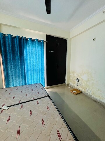 Bedroom in 3.5 BHK Apartment at Aims Golf City, Sector 75 – for Rent