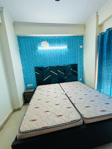 Bedroom in 3.5 BHK Apartment at Aims Golf City, Sector 75 – for Rent