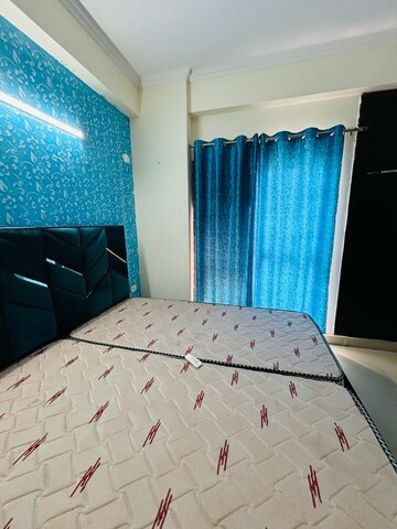 Bedroom in 3.5 BHK Apartment at Aims Golf City, Sector 75 – for Rent