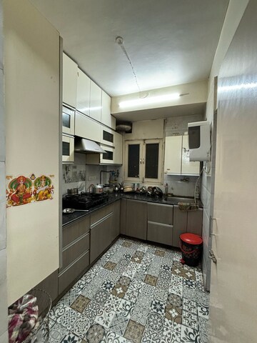 Kitchen in 2 BHK Apartment at Ashoka Group Housing Society, Sector 56 – for Rent