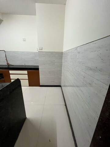 Kitchen in 2 BHK Apartment at Acme Ozone, Manpada – for Rent