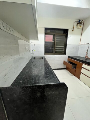 Kitchen in 2 BHK Apartment at Acme Ozone, Manpada – for Rent
