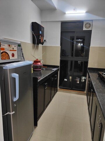 Kitchen in 1 BHK Apartment at Lodha Palava Downtown, Dombivli East – for Sale
