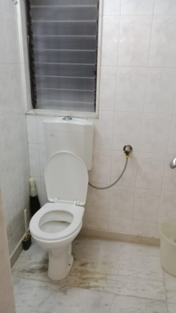 Bathroom in 2 BHK Apartment at Silver Sand CHS, Andheri West – for Rent