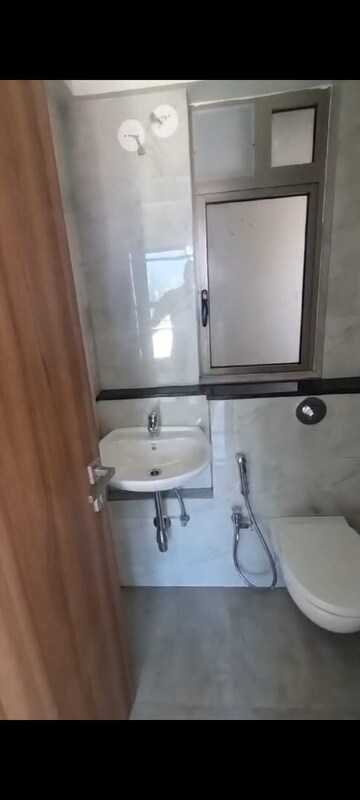 Bathroom in 1 BHK Apartment at Sheth Irene, Malad West – for Rent
