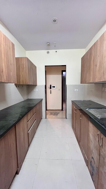 Kitchen in 2 BHK Apartment at Lodha Splendora, Ghodbunder Road – for Rent