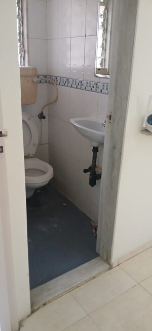 Bathroom in 2 BHK Apartment at Evershine Greens, Andheri West – for Sale