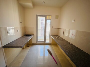 Kitchen in 2 BHK Apartment at Piramal Vaikunth, Balkum Pada – for Rent