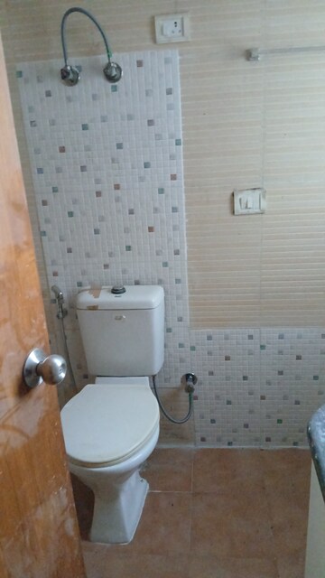 Bathroom in 3 BHK Apartment at Rudra Jagdambe Apartments, Sector 62 – for Rent