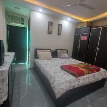 Bedroom in 1.5 BHK Builder Floor at Kalkaji – for Rent