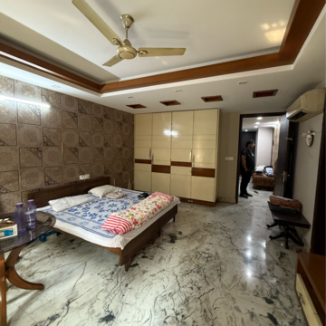 Bedroom in 4 BHK Builder Floor at Kalkaji – for Rent