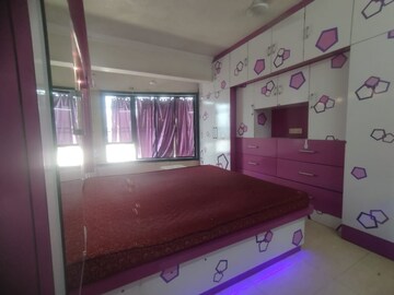 Bedroom in 3 BHK Apartment at Nandidham CHS, Seawoods – for Rent