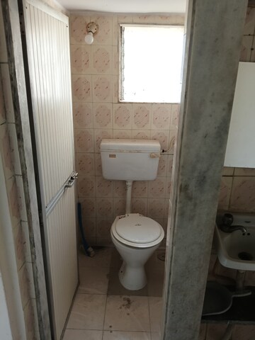 Bathroom in 1 BHK Apartment at Mathura CHS, Malad West – for Rent