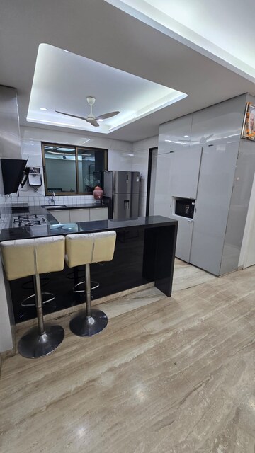 Kitchen in 4 BHK Penthouse at Vesu – for Sale