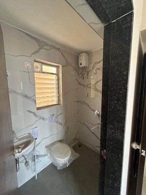 Bathroom in 1 BHK Apartment at Raunak Bliss, Ghodbunder Road – for Sale