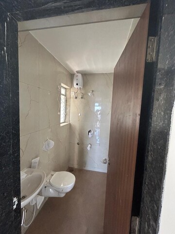 Bathroom in 1 BHK Apartment at Raunak Bliss, Ghodbunder Road – for Sale