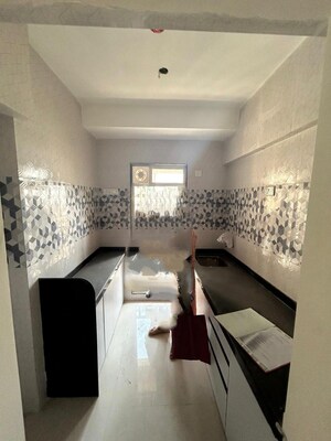 Kitchen in 1 BHK Apartment at Raunak Bliss, Ghodbunder Road – for Sale