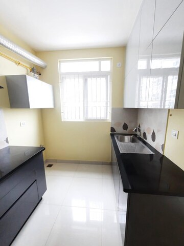 Kitchen in 2 BHK Apartment at Brigade Cornerstone Utopia, Varthur – for Rent