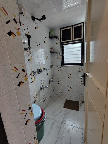 Bathroom in 1 BHK Apartment at Status CHS, Andheri West – for Rent