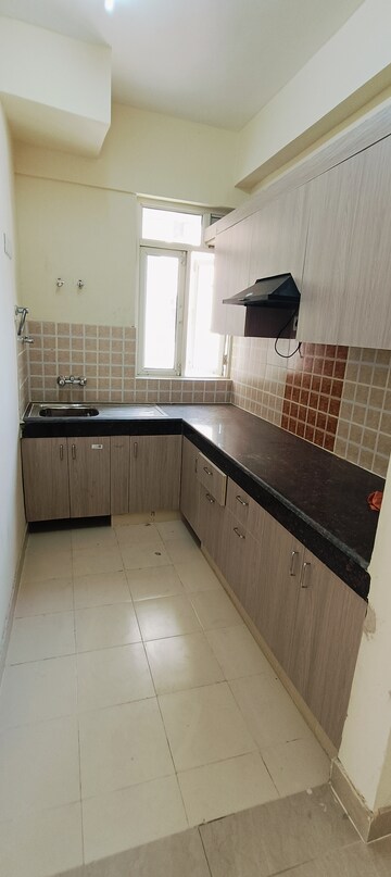 Kitchen in 2 BHK Apartment at Shree Vardhman Mantra, Sector 67 – for Rent