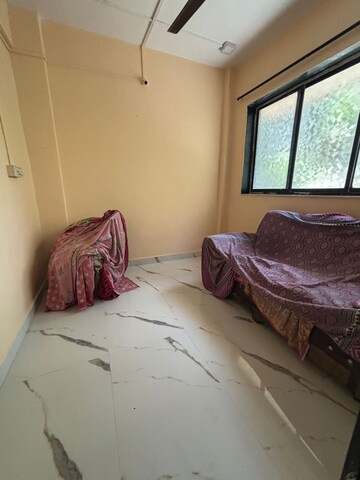 Living Room in 1.5 BHK Apartment at Kopar Khairane – for Rent