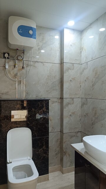 Bathroom in 2.5 BHK Apartment at Paschim Vihar – for Rent
