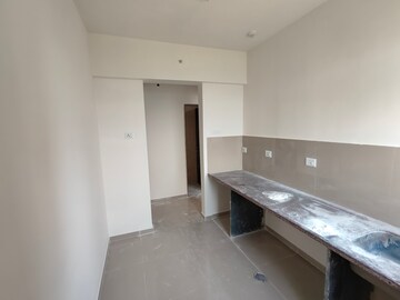 Kitchen in 1 BHK Apartment at Puraniks City Reserva, Ghodbunder Road – for Sale