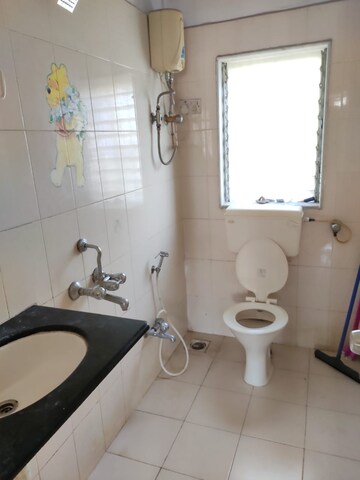 Bathroom in 2 BHK Apartment at Acme Ozone, Manpada – for Sale