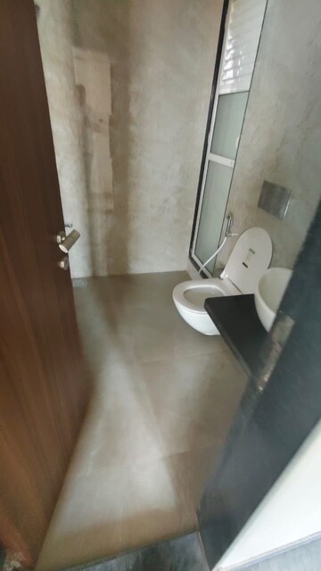 Bathroom in 2 BHK Apartment at Hiranandani Meadows, Manpada – for Rent