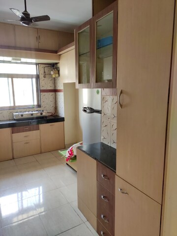 Kitchen in 1 BHK Apartment at Happy Valley, Manpada – for Sale