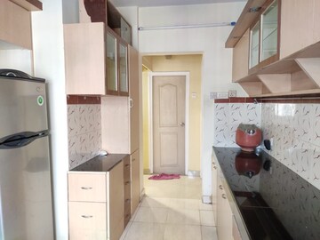 Kitchen in 1 BHK Apartment at Happy Valley, Manpada – for Sale