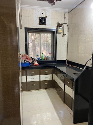 Kitchen in 3 BHK Apartment at Vasant Valley Ivy Tower, Malad East – for Sale
