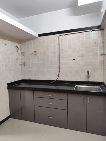 Kitchen in 2 BHK Apartment at Swapnapurti CHS Tilak Nagar, Tilak Nagar – for Rent