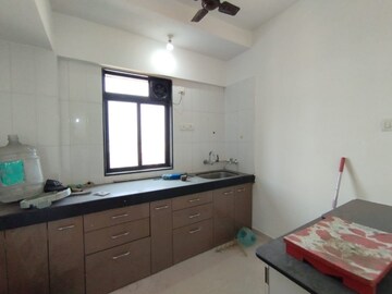 Kitchen in 1 BHK Apartment at Raunak City Phase 2, Kalyan West – for Sale
