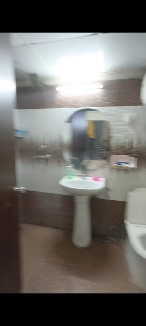 Bathroom in 2 BHK Apartment at Divyansh ARC Angels, Raj Nagar Extension – for Sale