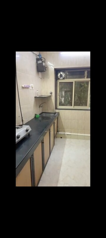 Kitchen in 2 BHK Apartment at Silver Sand CHS, Andheri West – for Rent
