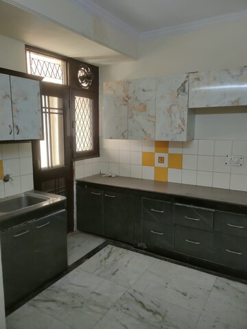 Kitchen in 3 BHK Builder Floor at Freedom Fighters Enclave – for Sale