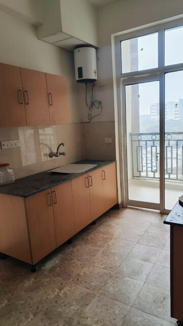 Kitchen in 3.5 BHK Apartment at Ansals Celebrity Greens, Sushant Golf City – for Rent