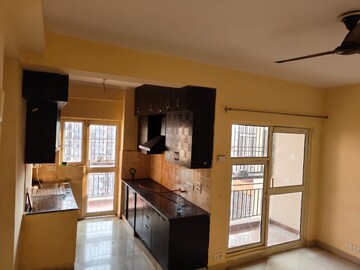 Living Room in 2 BHK Apartment at Aims Golf City, Sector 75 – for Rent