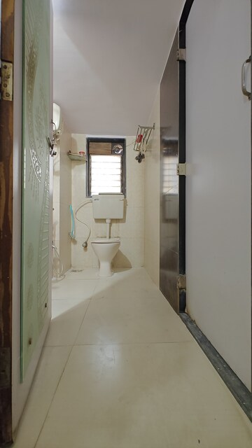 Bathroom in 2 BHK Apartment at Gangar K Guru Residency, Borivali West – for Rent