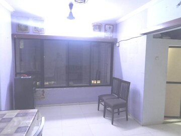 Living Room in 1 BHK Apartment at Bindra Complex, Andheri East – for Rent