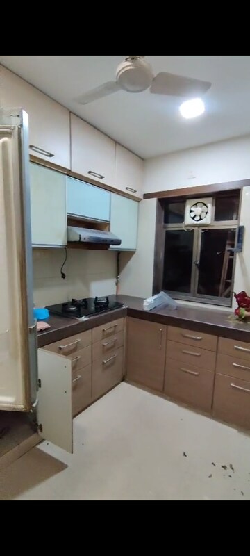 Kitchen in 2 BHK Apartment at Raheja Tipco Heights, Malad East – for Rent