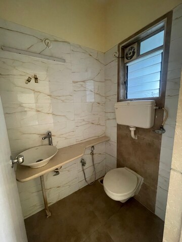 Bathroom in 1 BHK Apartment at Unique Shanti Signature, Mira Road – for Sale