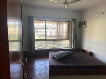 Living Room in 2 BHK Apartment at Zinnia CHS, Powai – for Rent